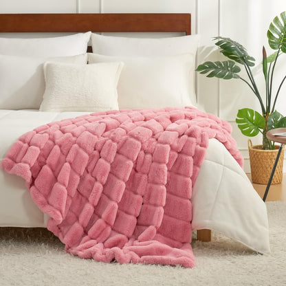 Coperta a righe in peluche tinta unita