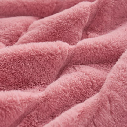 Coperta a righe in peluche tinta unita
