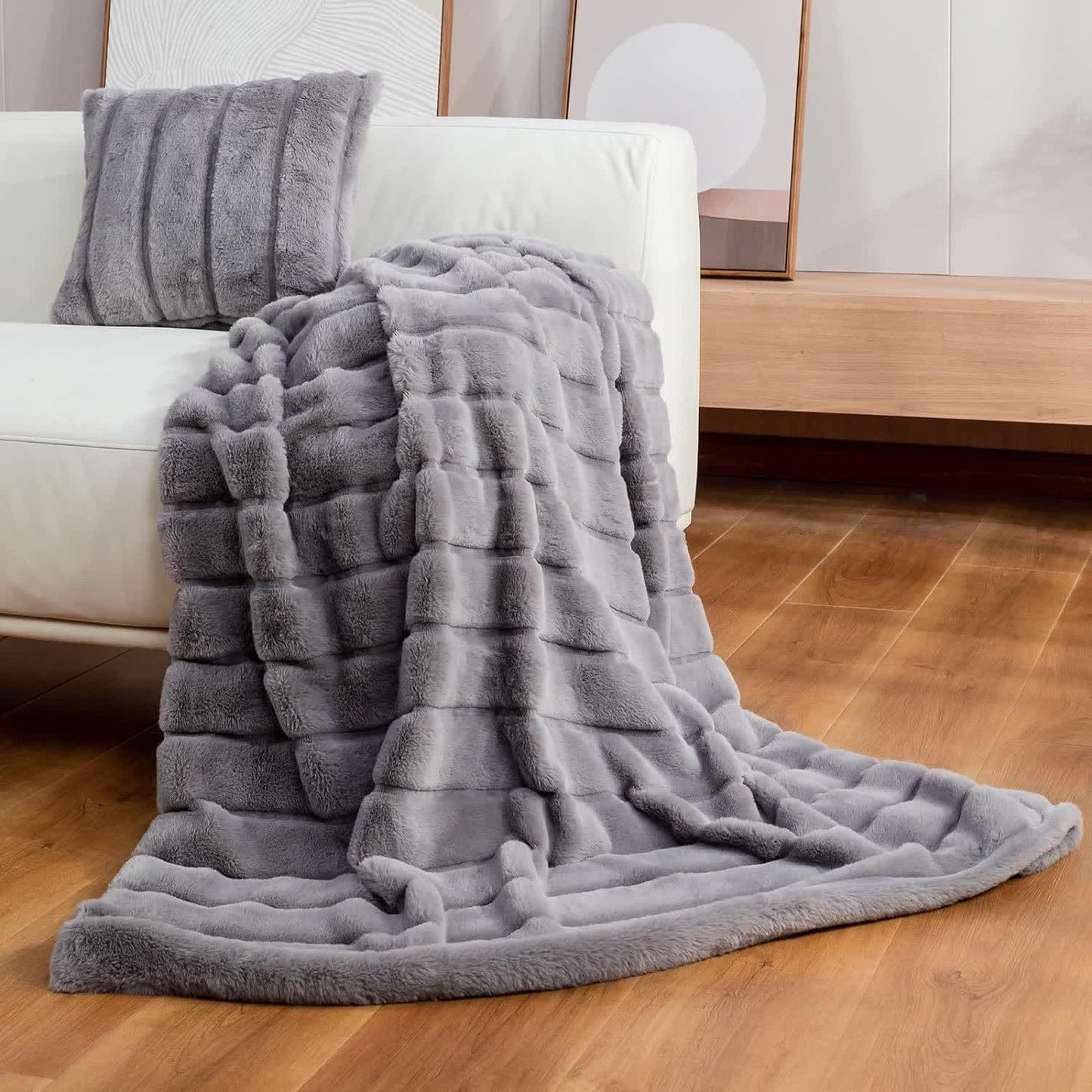 Coperta a righe in peluche tinta unita