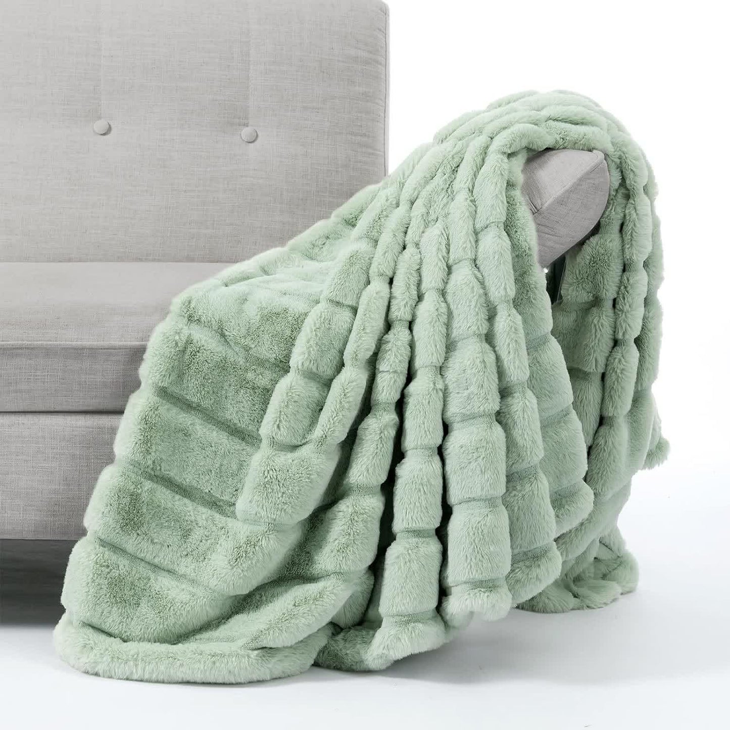 Coperta a righe in peluche tinta unita