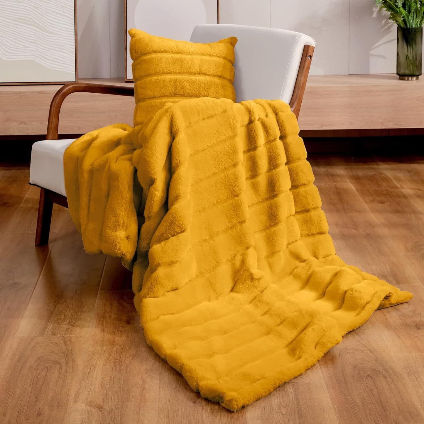 Coperta a righe in peluche tinta unita