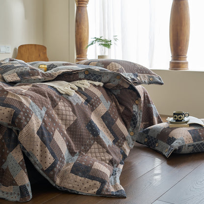 Set di biancheria da letto in garza di cotone con motivo patchwork geometrico (4 pezzi)