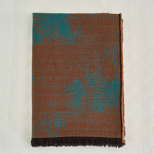 Coperta retrò con nappe in puro cotone tinto in filo