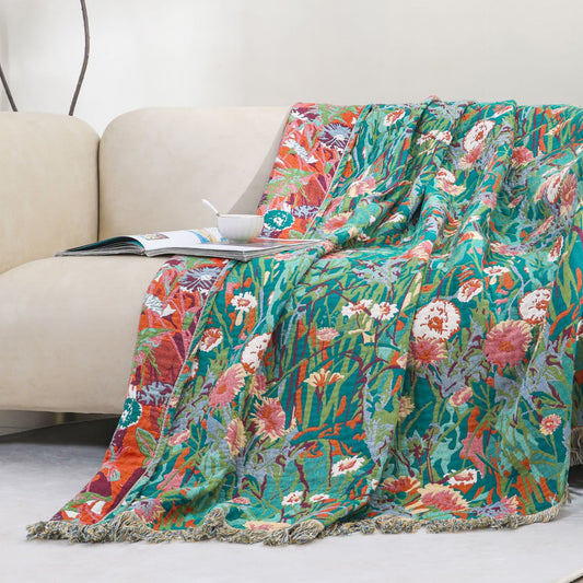 Coperta floreale reversibile in garza di cotone con nappa