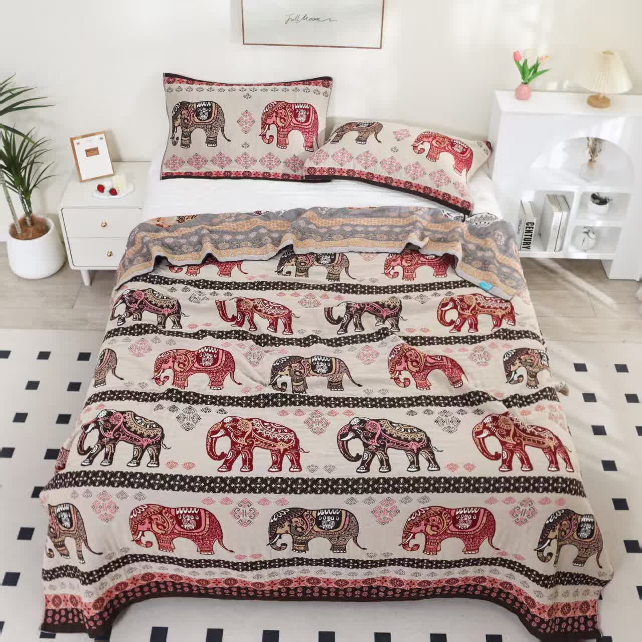 Trapunta in garza di cotone jacquard con elefante esotico