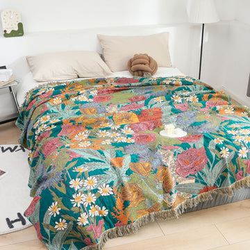 Trapunta reversibile in garza di cotone con fiori da giardino