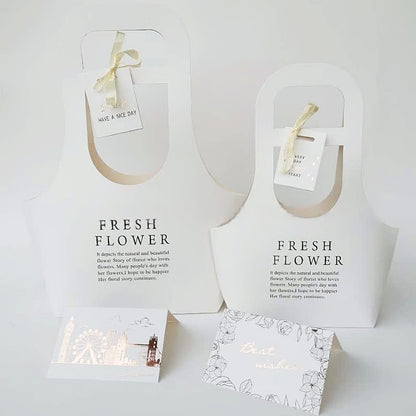 Sacchetti regalo in carta kraft con fiori e manico