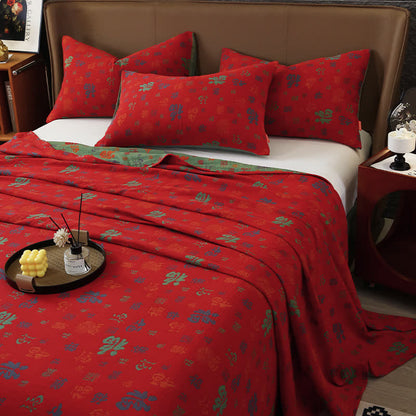 Copriletto in garza di cotone jacquard tinto in filo