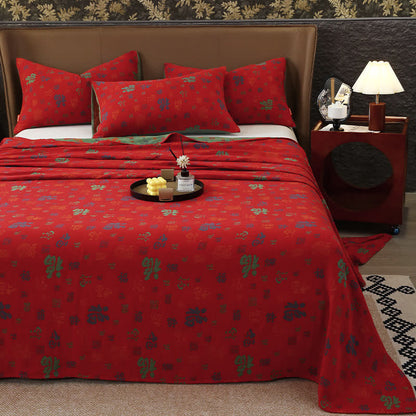 Copriletto in garza di cotone jacquard tinto in filo