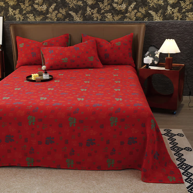 Copriletto in garza di cotone jacquard tinto in filo