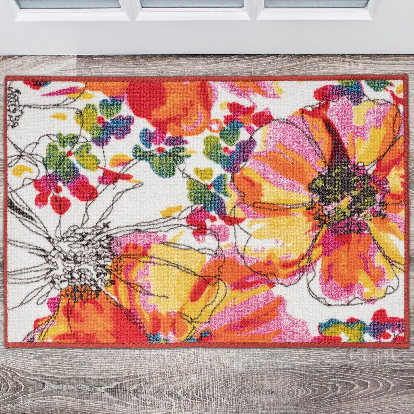 Tappeto con foglie e fiori di colore tropicale