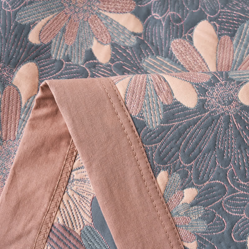 Trapunta jacquard tinta in filo in garza di cotone floreale