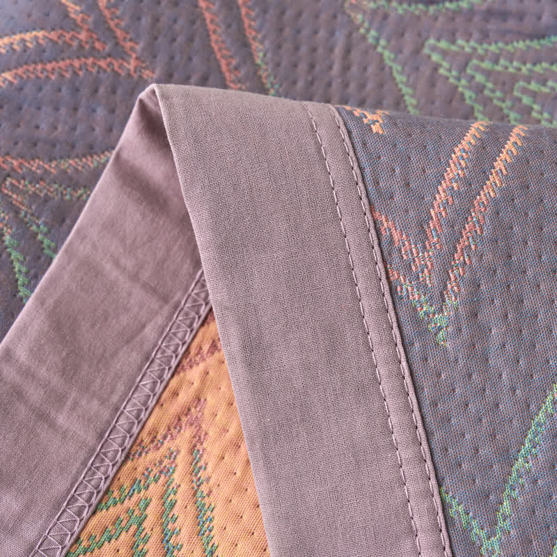 Trapunta traspirante in garza di cotone tinto in filo jacquard