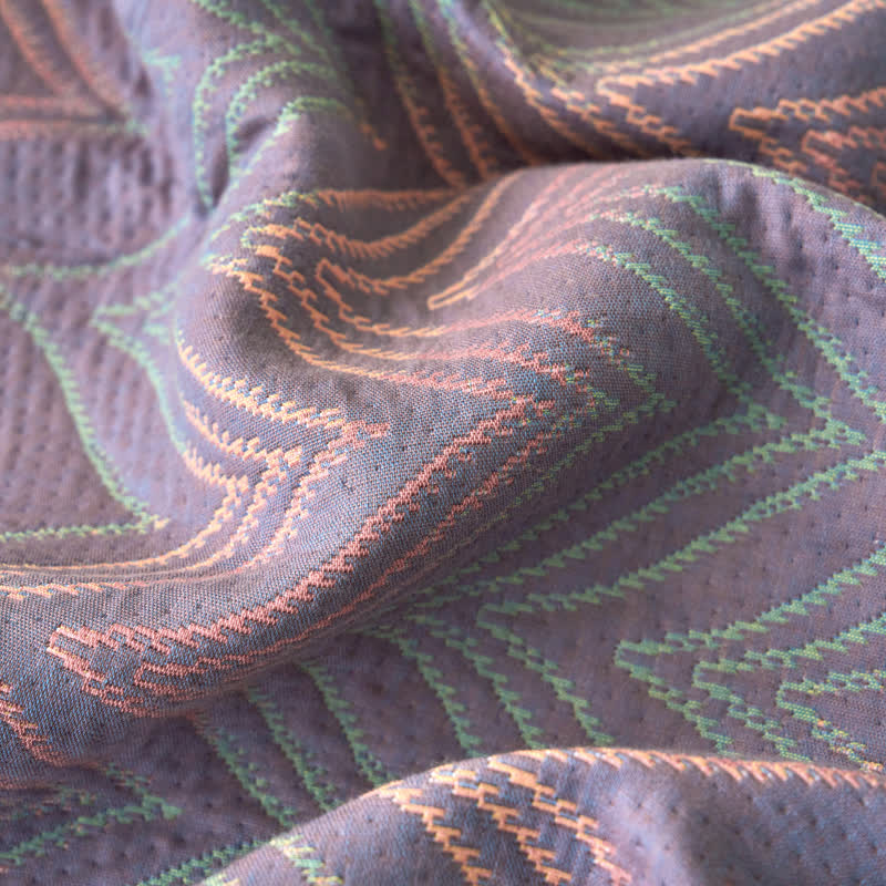 Trapunta traspirante in garza di cotone tinto in filo jacquard