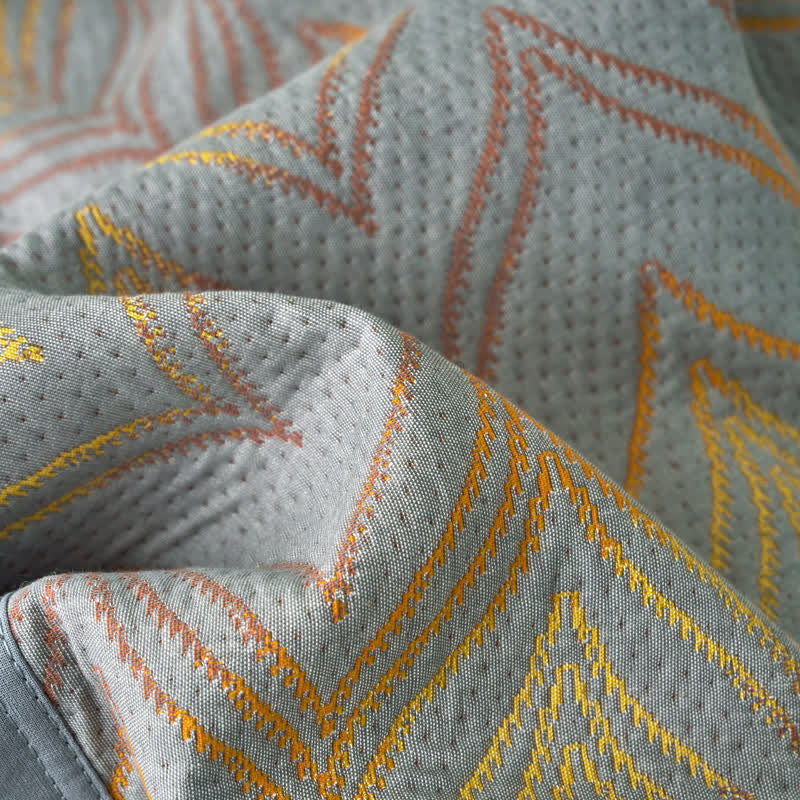 Trapunta traspirante in garza di cotone tinto in filo jacquard