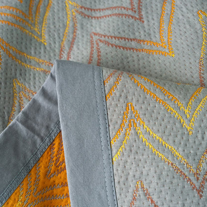 Coperta traspirante in garza di cotone tinto in filo jacquard