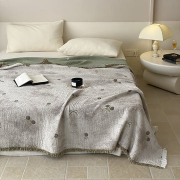 Trapunta reversibile con nappe in garza di cotone tinto in filo