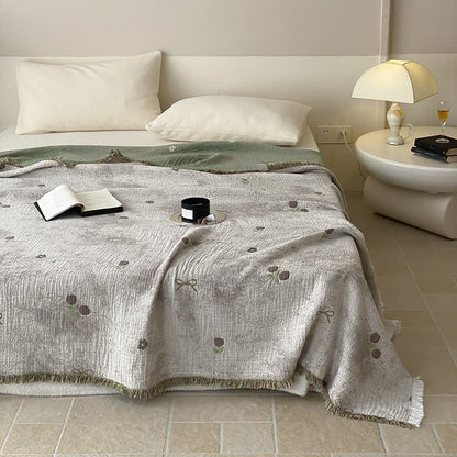 Trapunta reversibile con nappe in garza di cotone tinto in filo