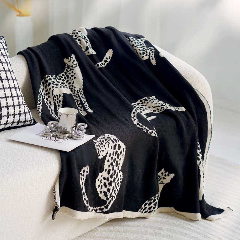 Coperta reversibile lavorata a maglia con motivo leopardato retrò