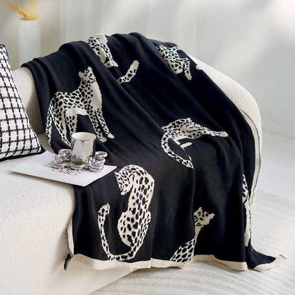 Coperta reversibile lavorata a maglia con motivo leopardato retrò