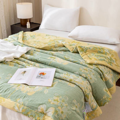 Trapunta floreale in garza di cotone tinto in filo jacquard