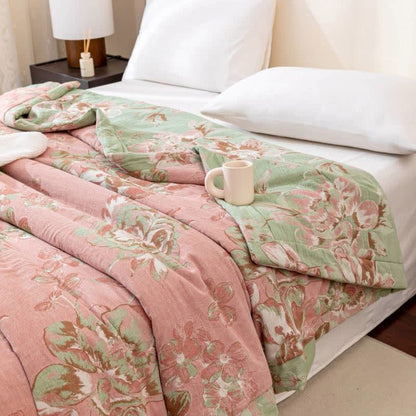 Trapunta floreale in garza di cotone tinto in filo jacquard