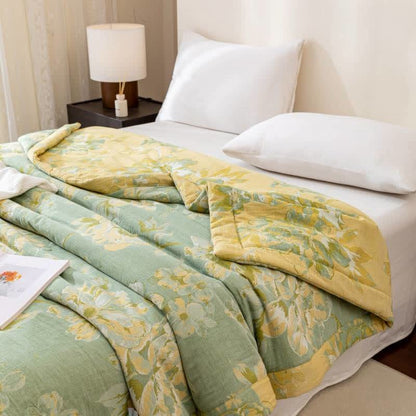 Trapunta floreale in garza di cotone tinto in filo jacquard