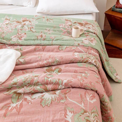 Trapunta floreale in garza di cotone tinto in filo jacquard