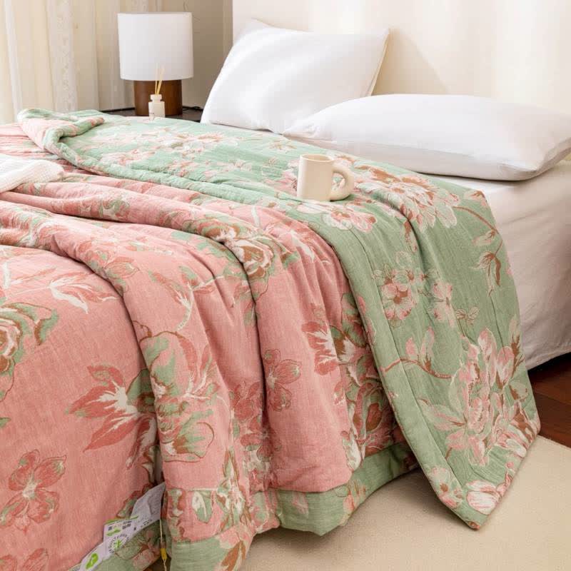 Trapunta floreale in garza di cotone tinto in filo jacquard