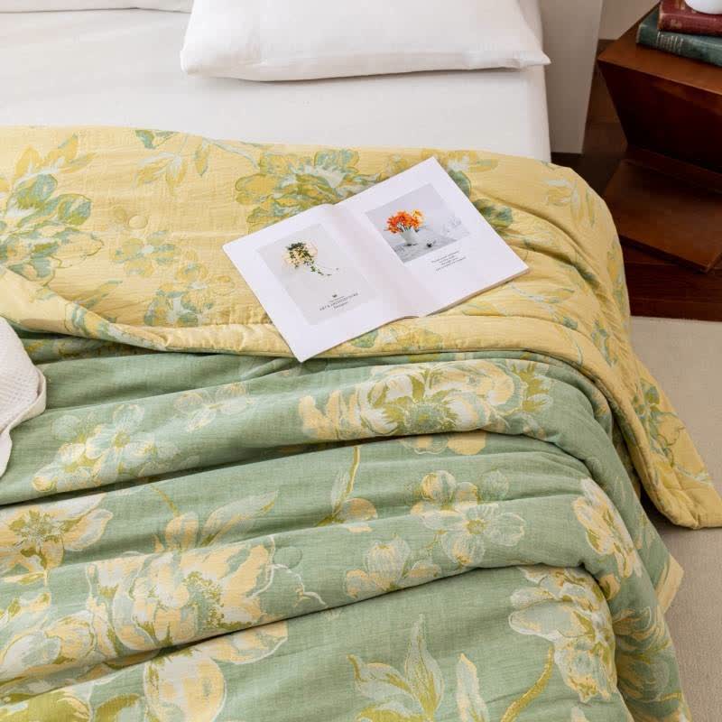 Trapunta floreale in garza di cotone tinto in filo jacquard