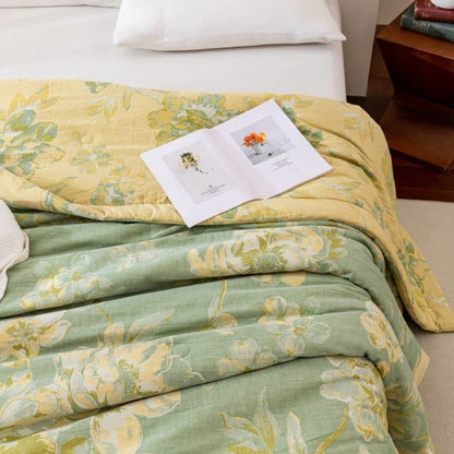 Trapunta floreale in garza di cotone tinto in filo jacquard