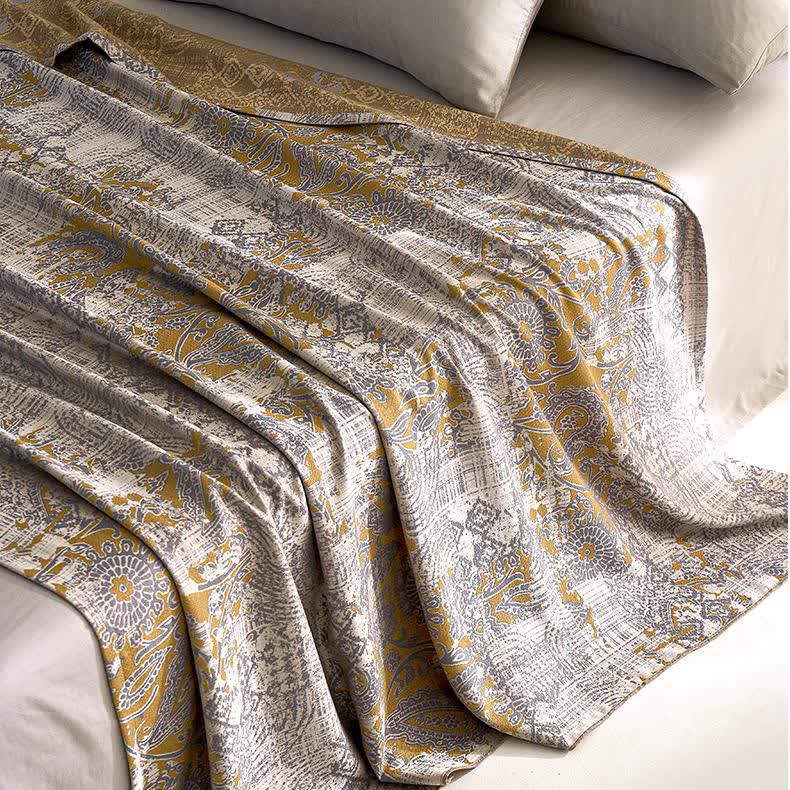 Trapunta morbida e traspirante in fibra di Lyocell con motivo jacquard Paisley