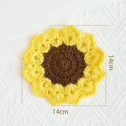 Sottobicchiere in filato all'uncinetto con fiori fatti a mano