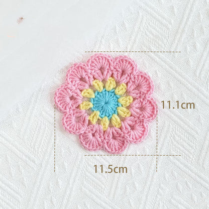Sottobicchiere in filato all'uncinetto con fiori fatti a mano