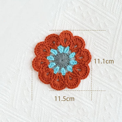 Sottobicchiere in filato all'uncinetto con fiori fatti a mano