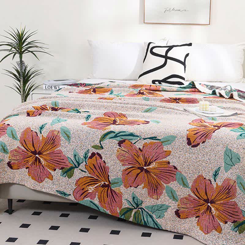 Trapunta reversibile in garza di cotone jacquard con motivo a fiori di pesco