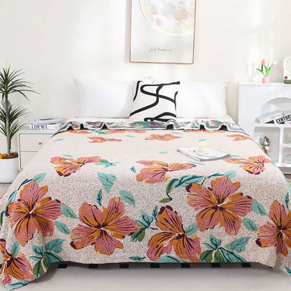 Trapunta reversibile in garza di cotone jacquard con motivo a fiori di pesco