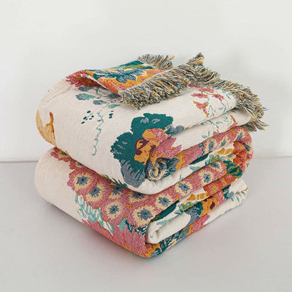 Trapunta reversibile con nappe in garza multistrato in cotone floreale