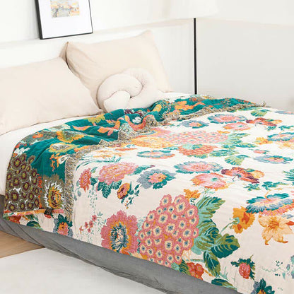 Trapunta reversibile con nappe in garza multistrato in cotone floreale