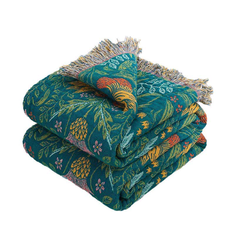 Trapunta reversibile in garza di cotone con nappe a forma di fiore