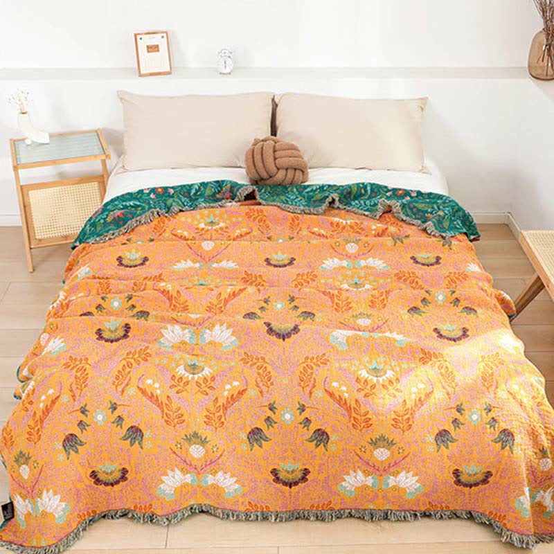 Trapunta reversibile in garza di cotone con nappe a forma di fiore