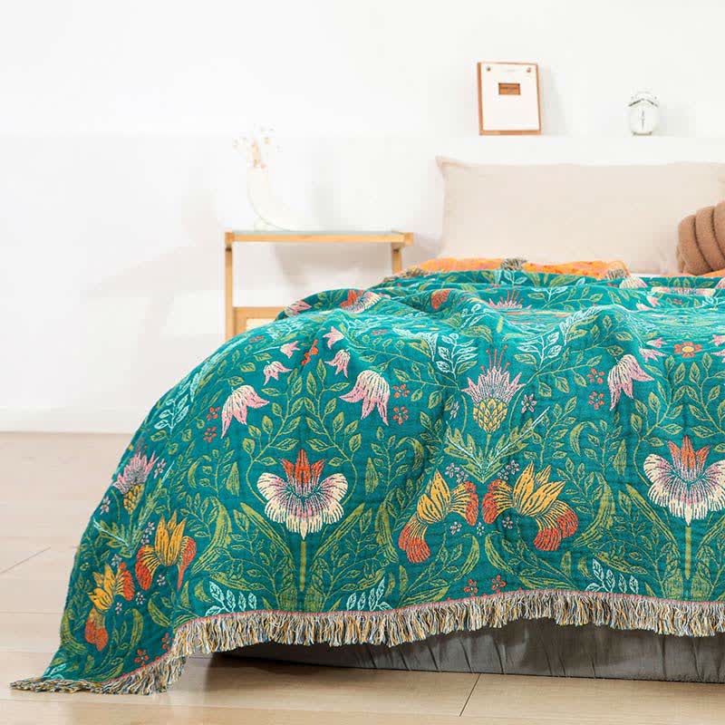 Trapunta reversibile in garza di cotone con nappe a forma di fiore