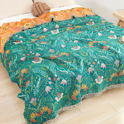Trapunta reversibile in garza di cotone con nappe a forma di fiore