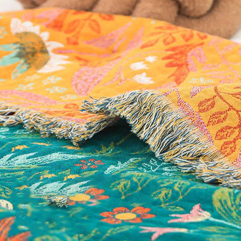 Trapunta reversibile in garza di cotone con nappe a forma di fiore