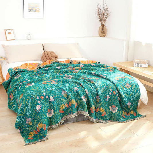 Trapunta reversibile in garza di cotone con nappe a forma di fiore
