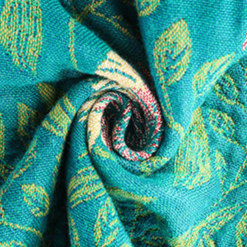 Trapunta reversibile in garza di cotone con nappe a forma di fiore