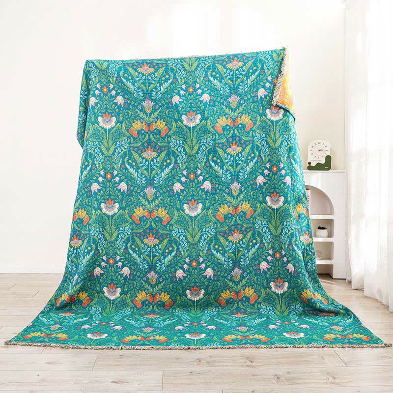 Trapunta reversibile in garza di cotone con nappe a forma di fiore