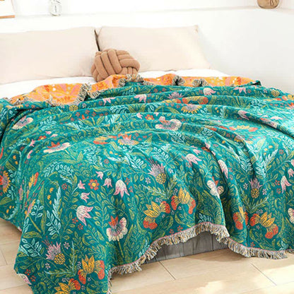 Trapunta reversibile in garza di cotone con nappe a forma di fiore