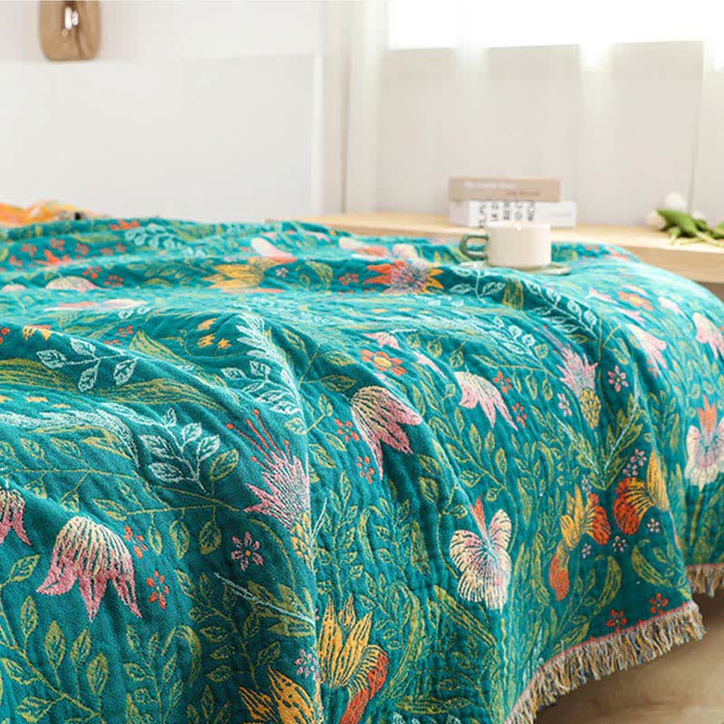Trapunta reversibile in garza di cotone con nappe a forma di fiore