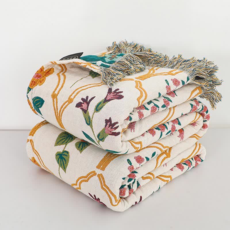 Trapunta reversibile in garza di cotone con motivo floreale a rombi